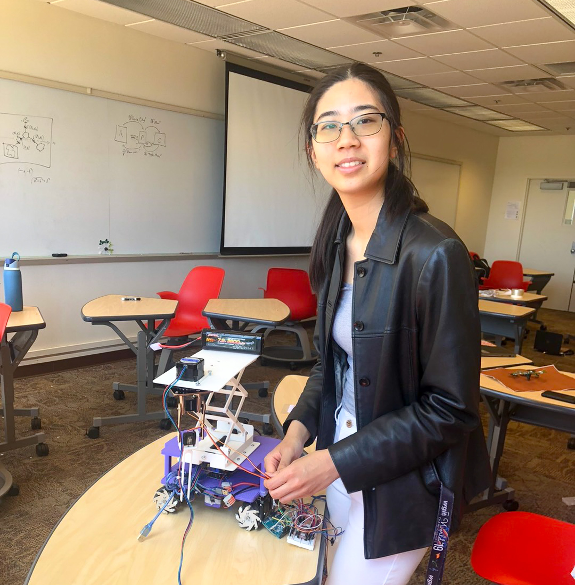 student works on a robot